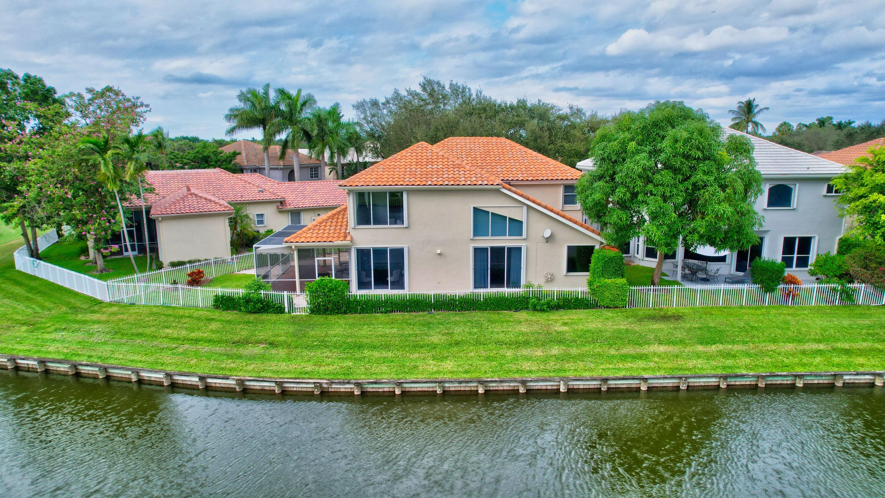 4100 Northwest 58th Lane Boca Raton, FL 33496 - Photo 3 of 32 04_dji_0096_097_098_099_100