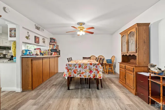a bedroom with a bed and dresser
