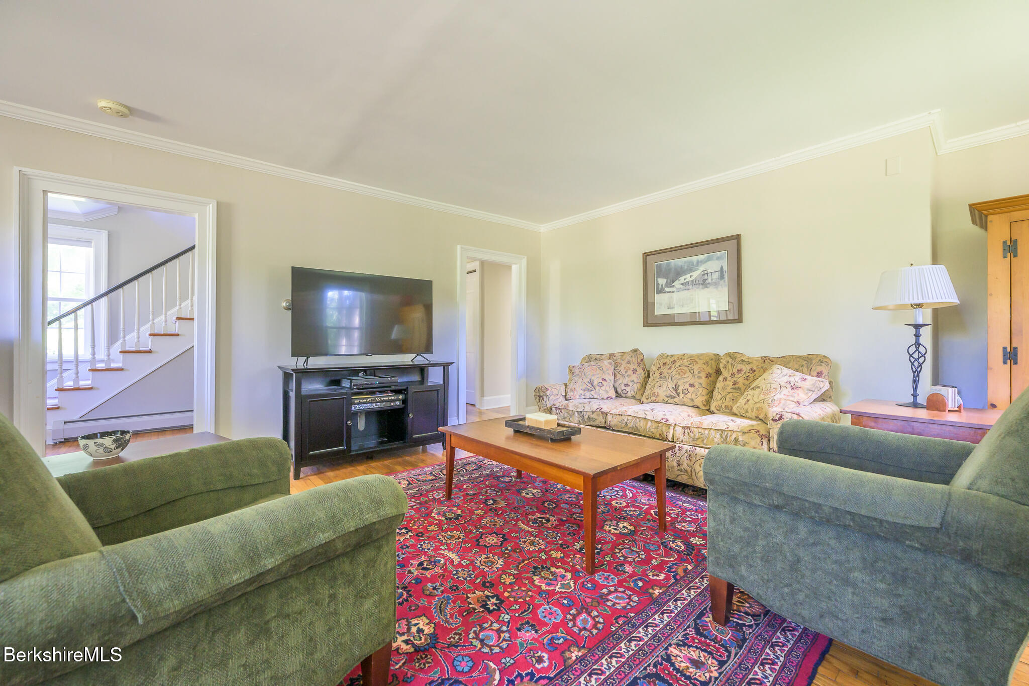 51 Albany Road West Stockbridge, MA 01266 - Photo 12 of 58 a living room with furniture and a flat screen tv
