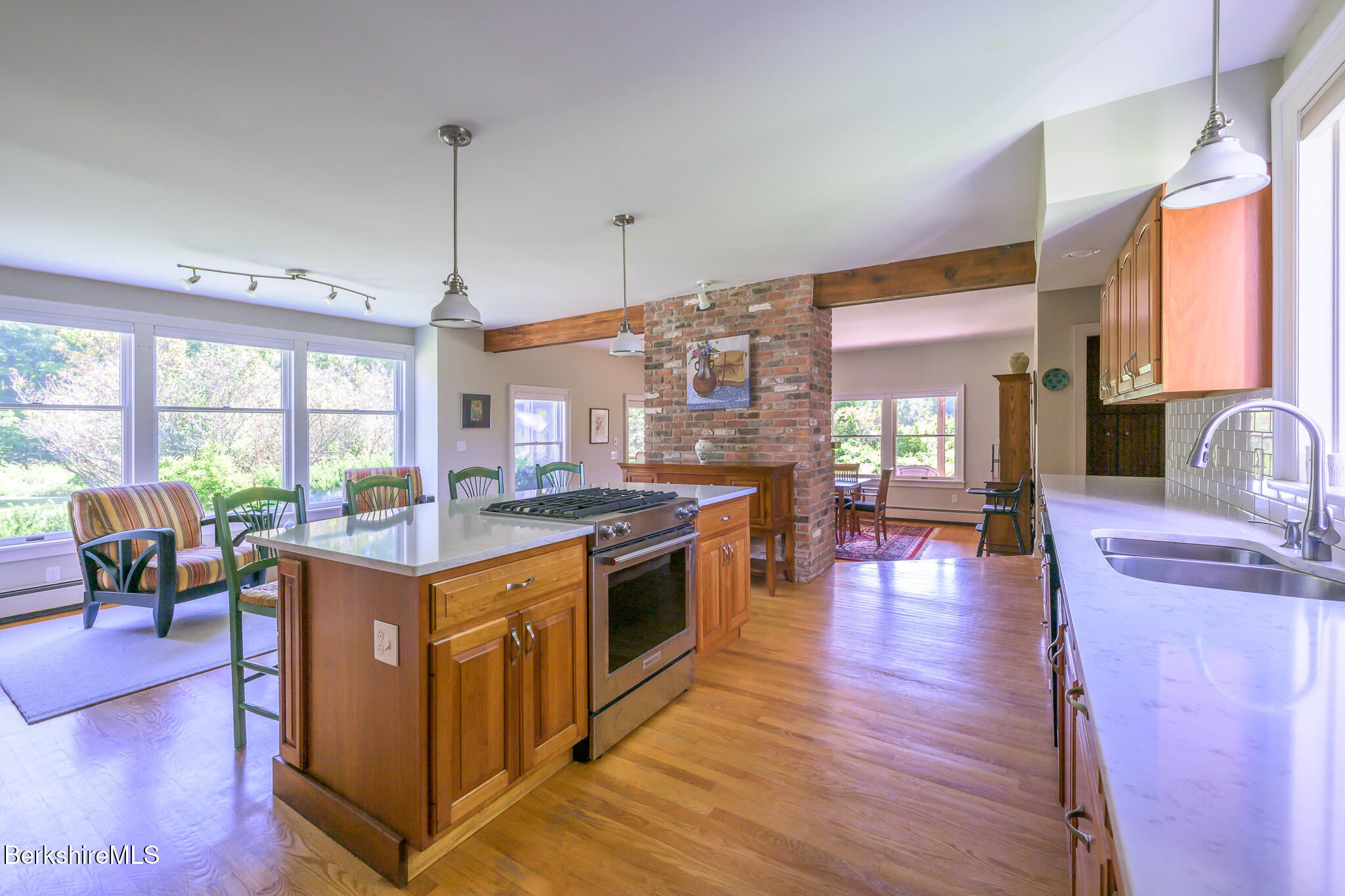 51 Albany Road West Stockbridge, MA 01266 - Photo 16 of 58 a kitchen with stainless steel appliances granite countertop a stove and wooden floor
