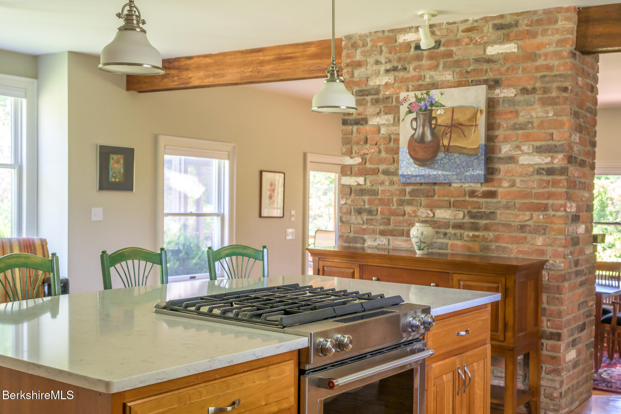 51 Albany Road West Stockbridge, MA 01266 - Photo 17 of 58 a kitchen with granite countertop a stove and a white cabinets