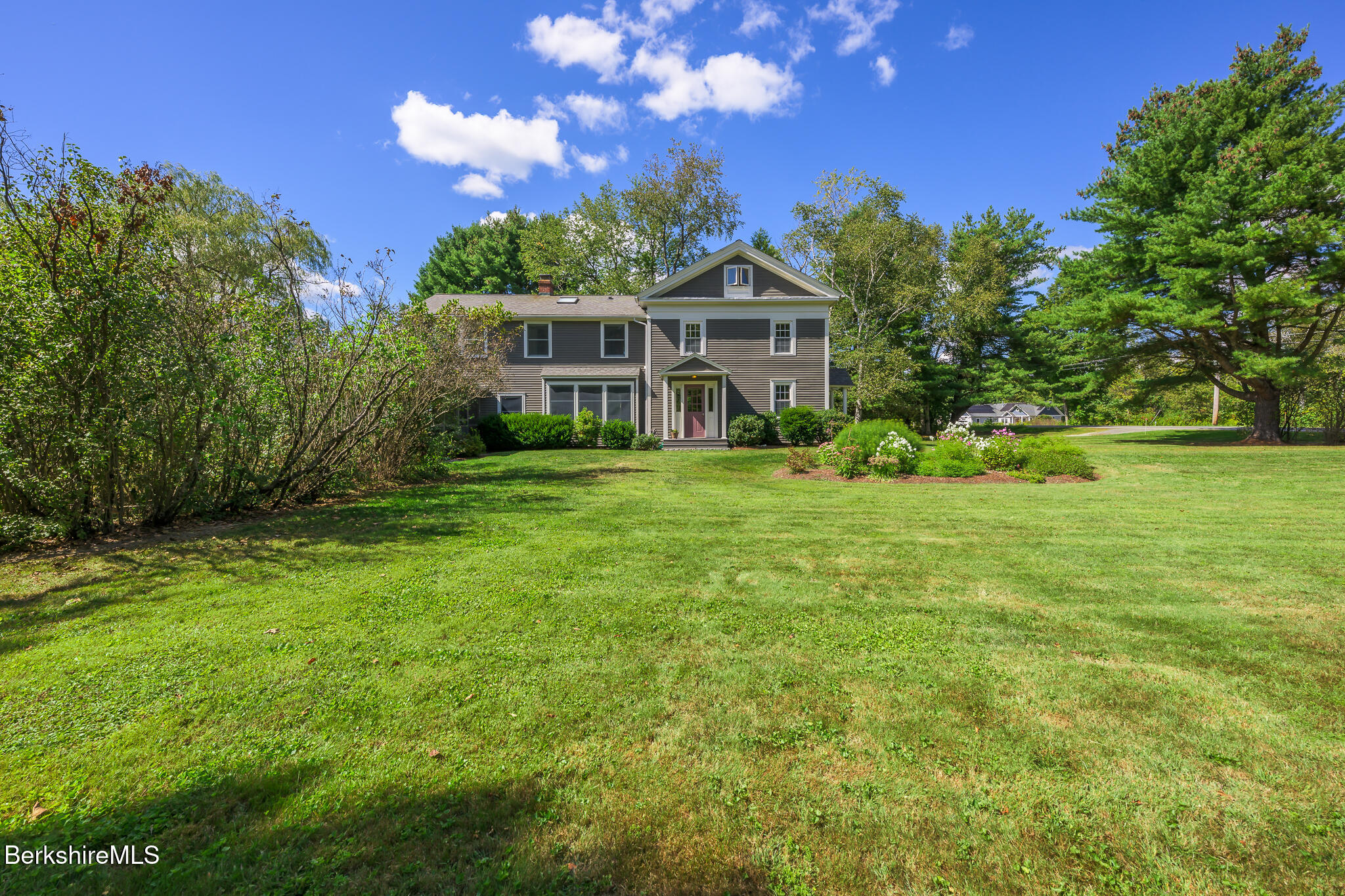 51 Albany Road West Stockbridge, MA 01266 - Photo 2 of 58 a front view of a house with garden