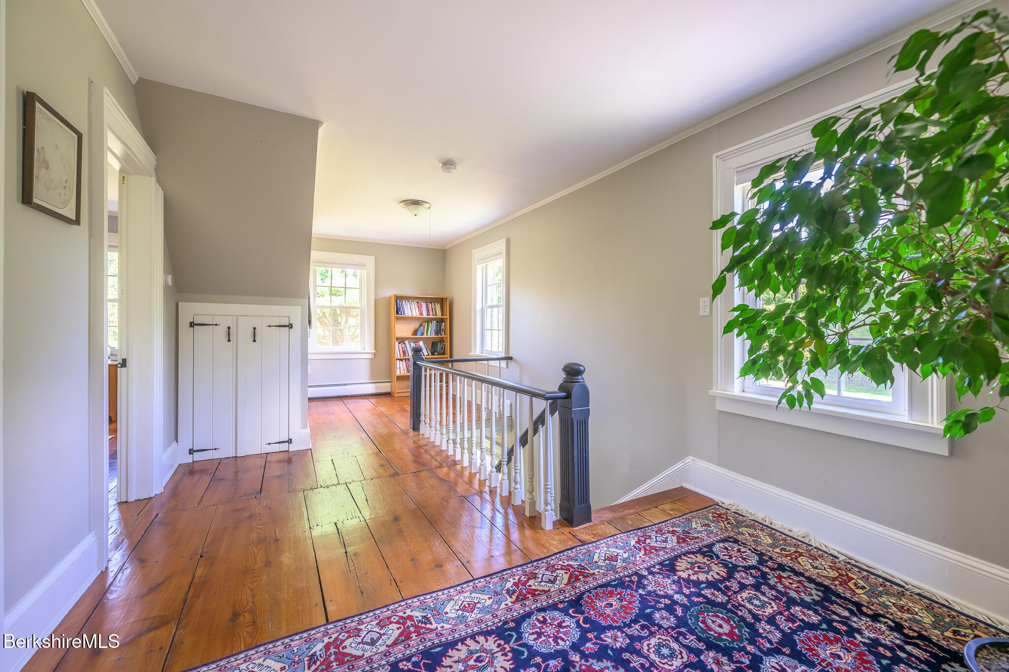 51 Albany Road West Stockbridge, MA 01266 - Photo 30 of 58 a view of a bedroom with wooden floor and a window