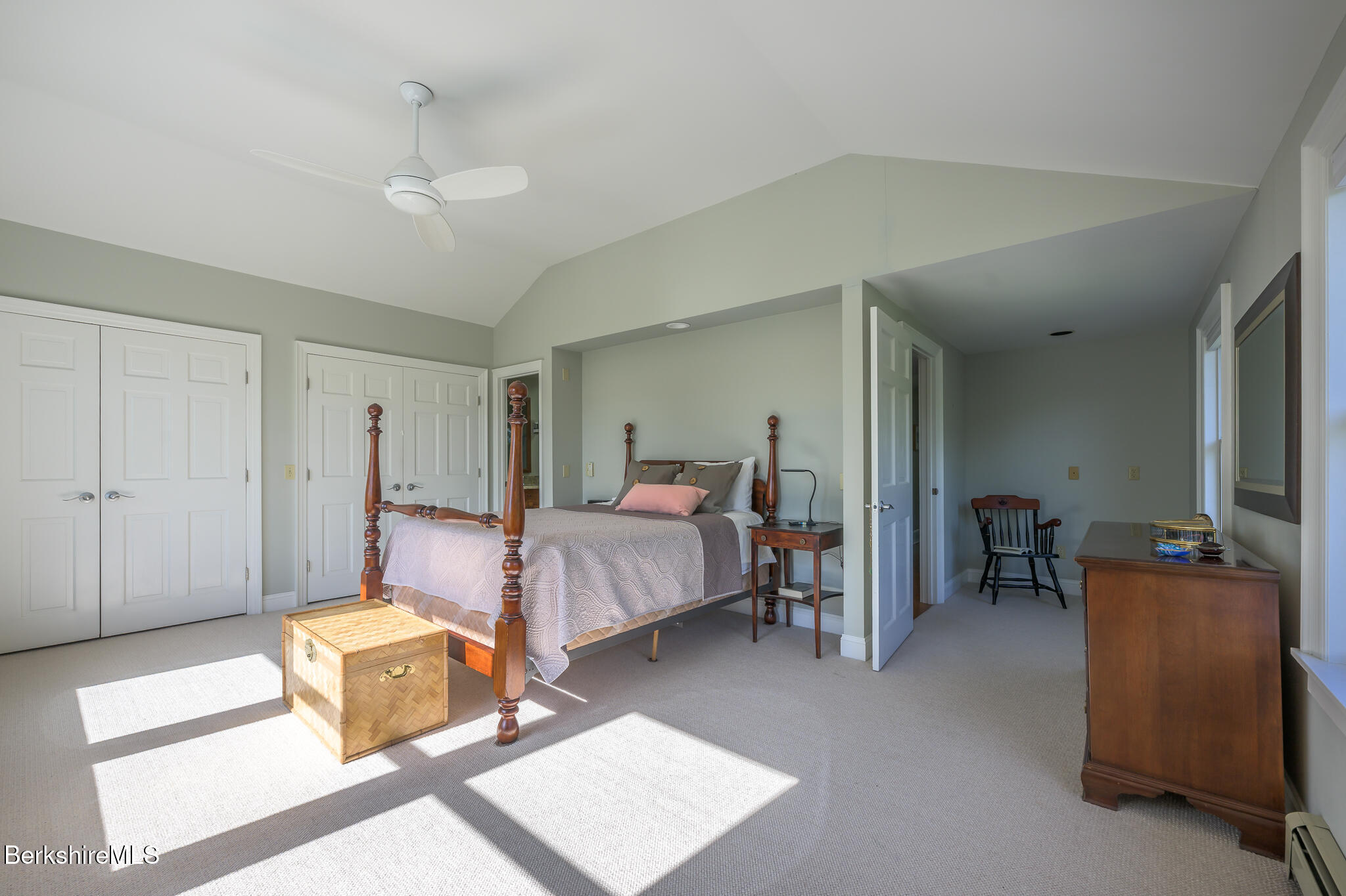 51 Albany Road West Stockbridge, MA 01266 - Photo 37 of 58 a bedroom with bed and a chandelier