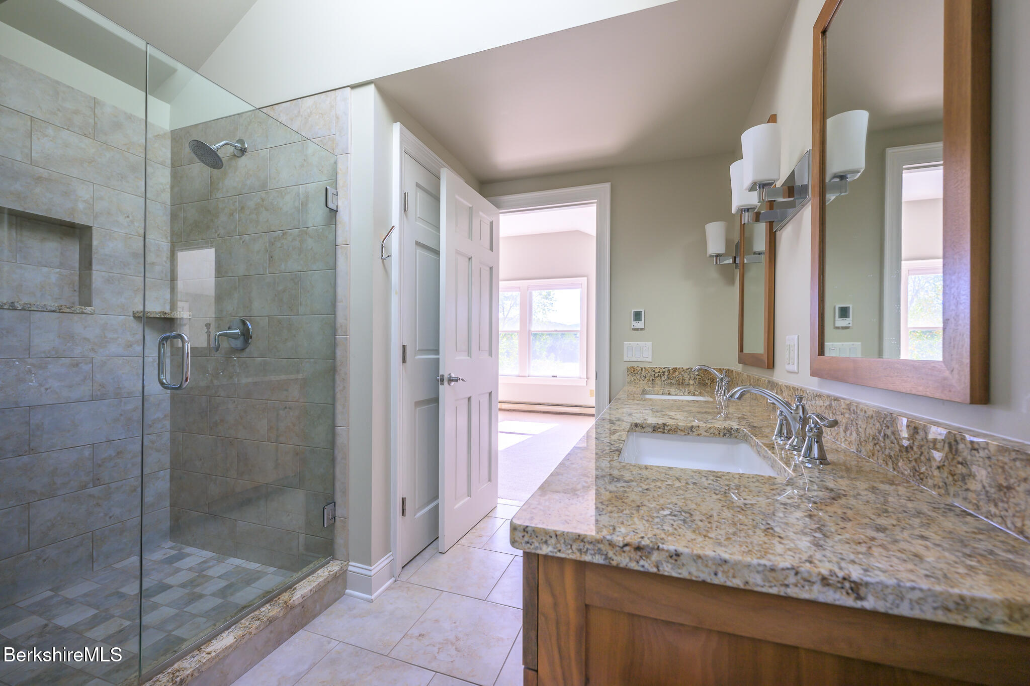 51 Albany Road West Stockbridge, MA 01266 - Photo 40 of 58 a bathroom with a granite countertop sink mirror and shower