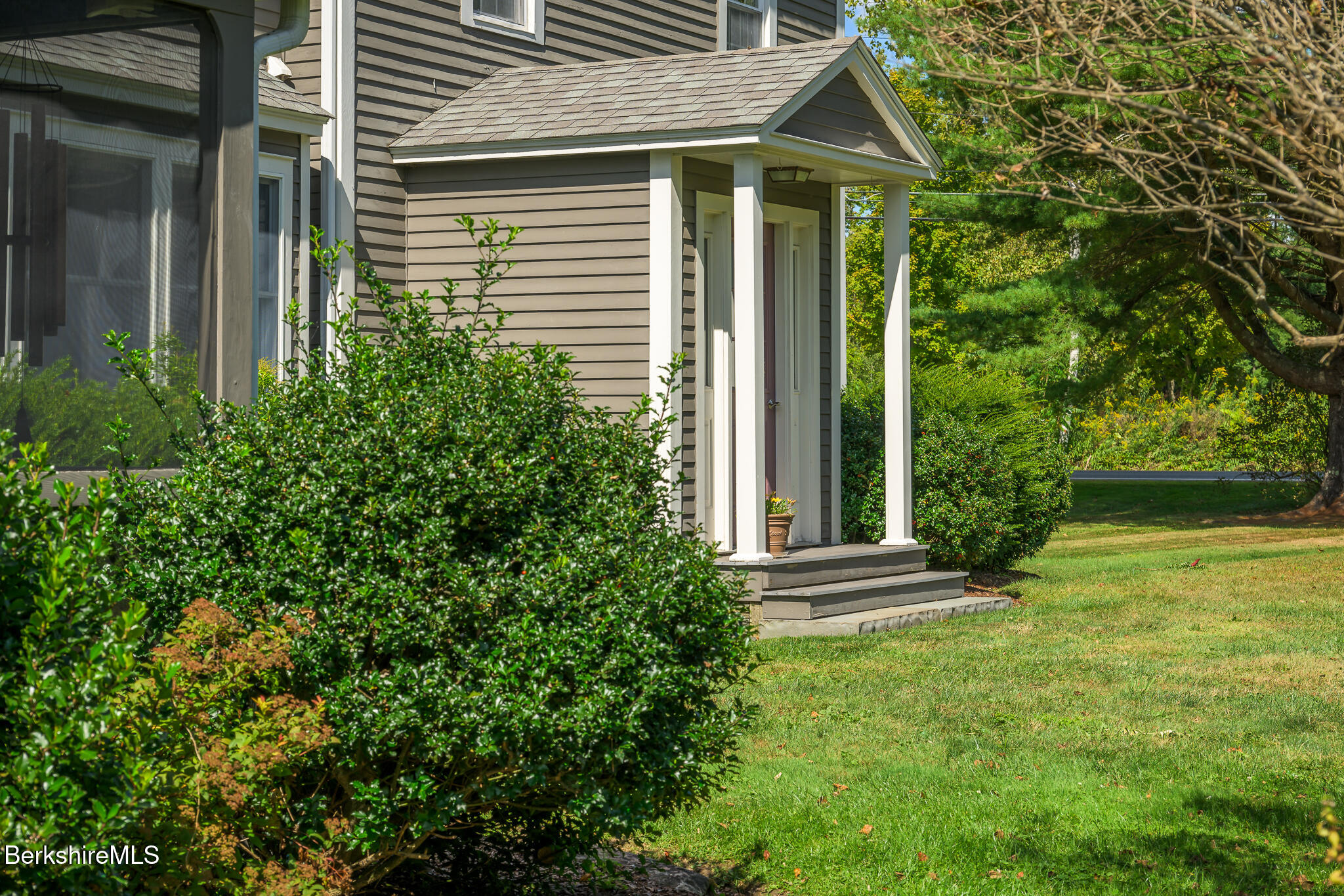 51 Albany Road West Stockbridge, MA 01266 - Photo 6 of 58 a front view of a house with a yard