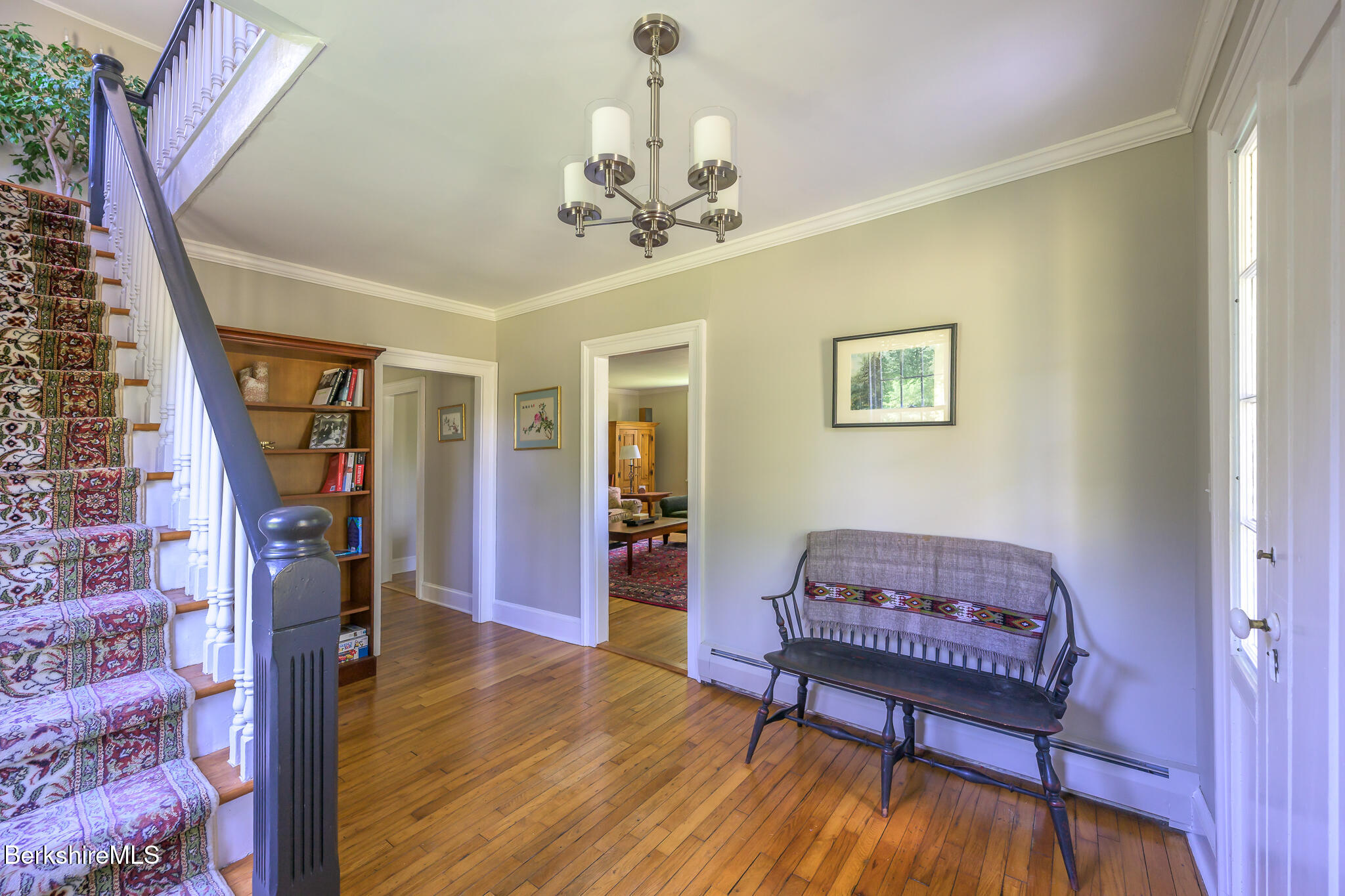 51 Albany Road West Stockbridge, MA 01266 - Photo 10 of 58 a living room with furniture and a chandelier