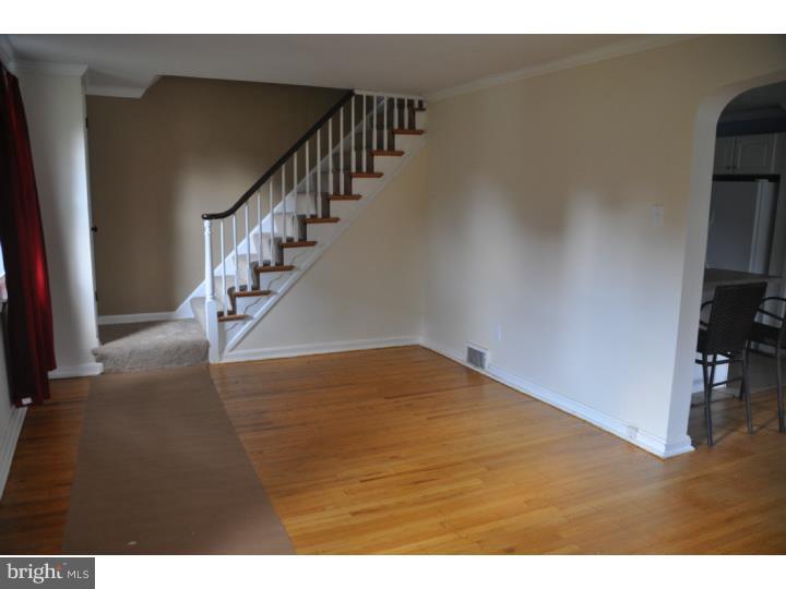 250 Fairview Road Springfield, PA 19064 - Photo 3 of 19 a view of entryway and hall with wooden floor