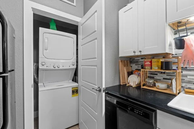 a kitchen with a stove and a refrigerator