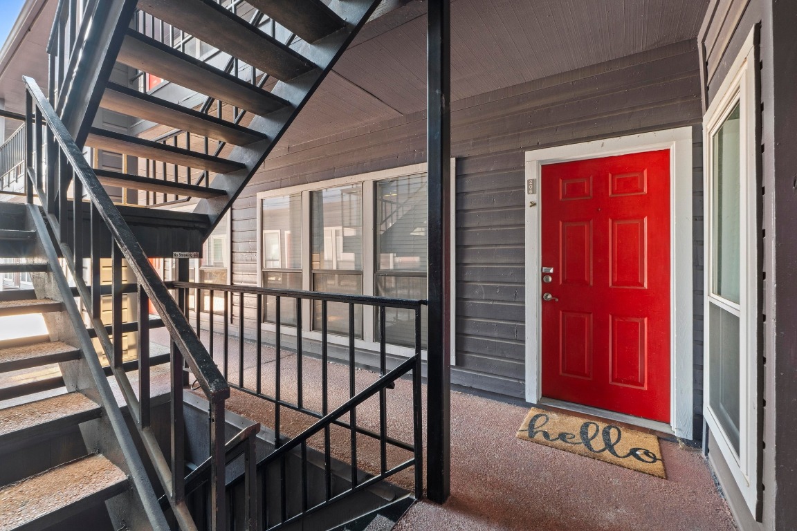 2804 Rio Grande Street, Unit 206 Austin, TX 78705 - Photo 14 of 21 a view of a hallway with wooden floor and windows