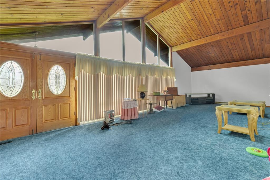 145 Oakhill Road Aliquippa, PA 15001 - Photo 12 of 23 a view of a livingroom with furniture and a window