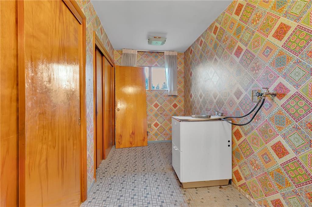 145 Oakhill Road Aliquippa, PA 15001 - Photo 14 of 23 a bathroom with a shower and a sink