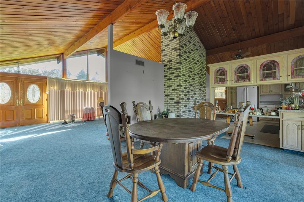 145 Oakhill Road Aliquippa, PA 15001 - Photo 10 of 23 a dining room with a table and chairs