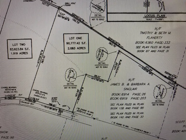 a view of a street with a building