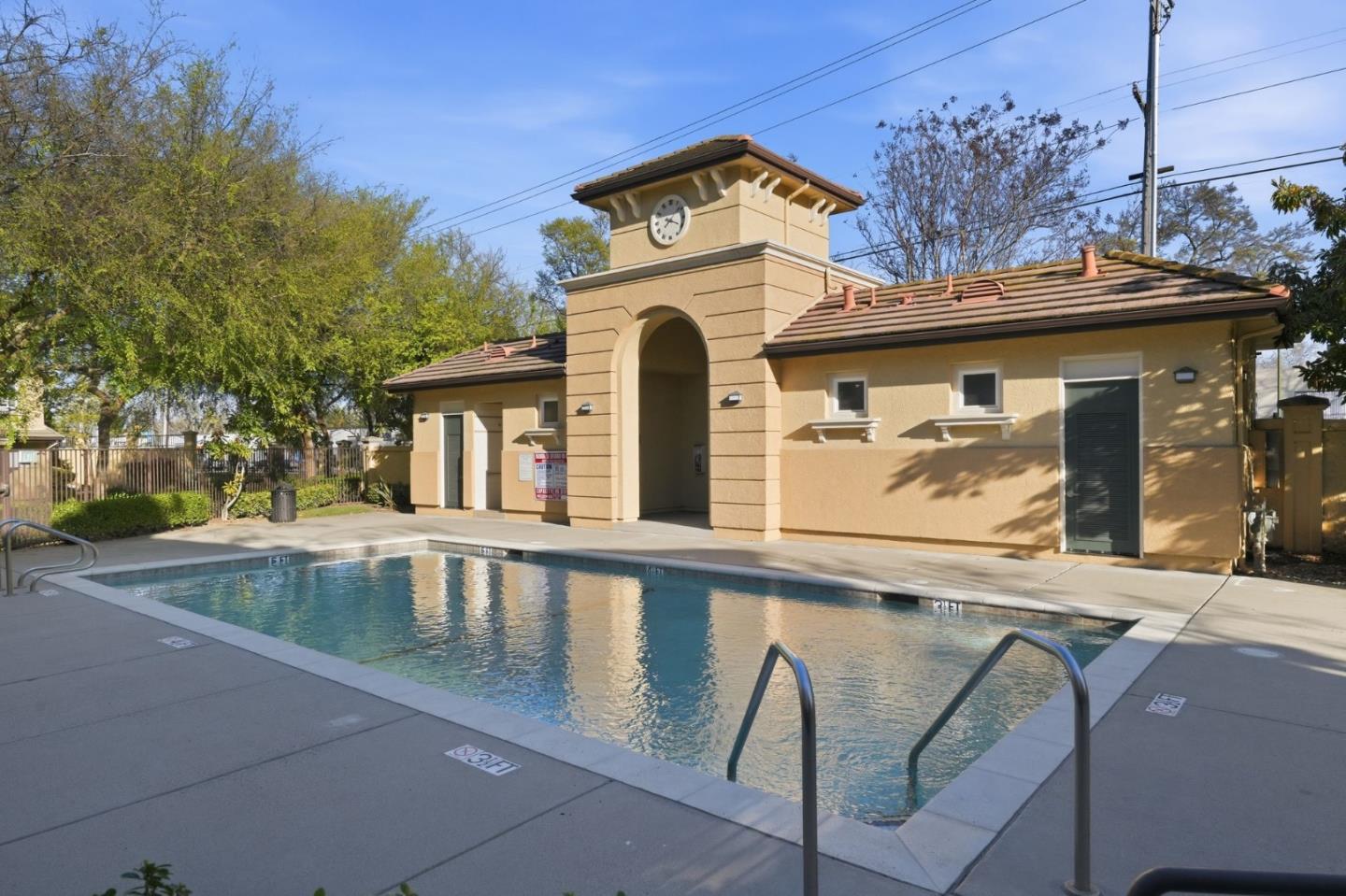 5050 Ruffino Terrace San Jose, CA 95129 - Photo 25 of 26 a view of a white building with a large windows