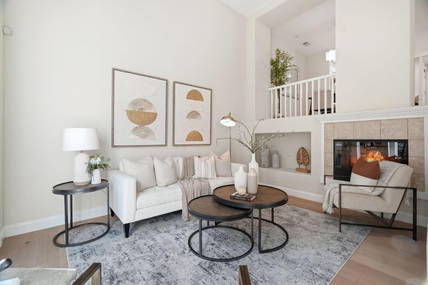 5050 Ruffino Terrace San Jose, CA 95129 - Photo 7 of 26 a living room with furniture a rug and a table