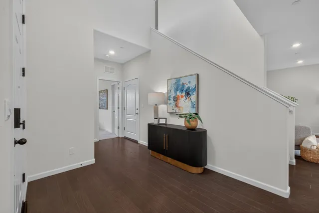 a view of kitchen with furniture and wooden floor