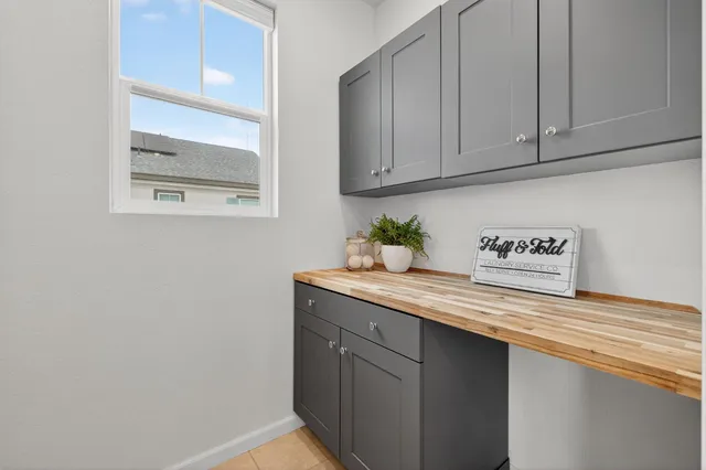 a view of cabinets and window