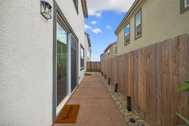 a view of a pathway of a building with entryway