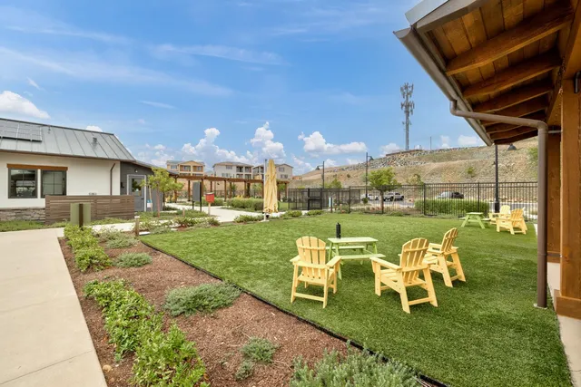 a patio with table and chairs