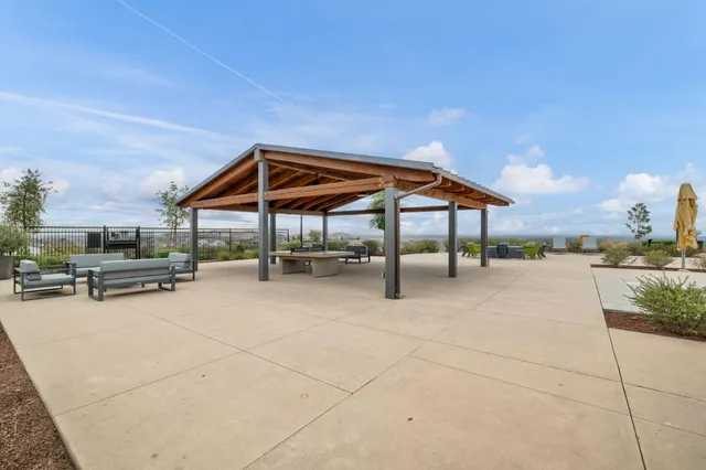 a view of a terrace with chairs
