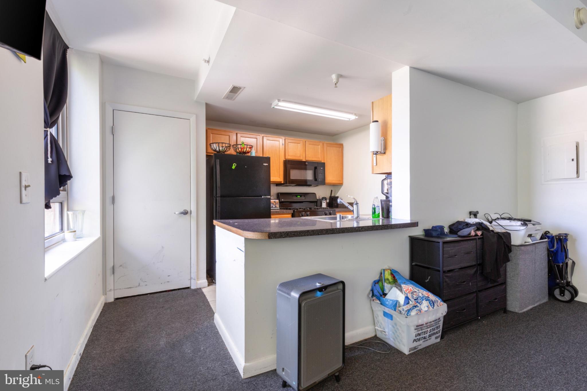 350 G Street Southwest, Unit N423 Washington, DC 20024 - Photo 16 of 43 Cozy kitchen with modern finishes.