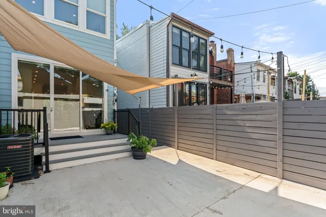 a view of a building with a window and stairs