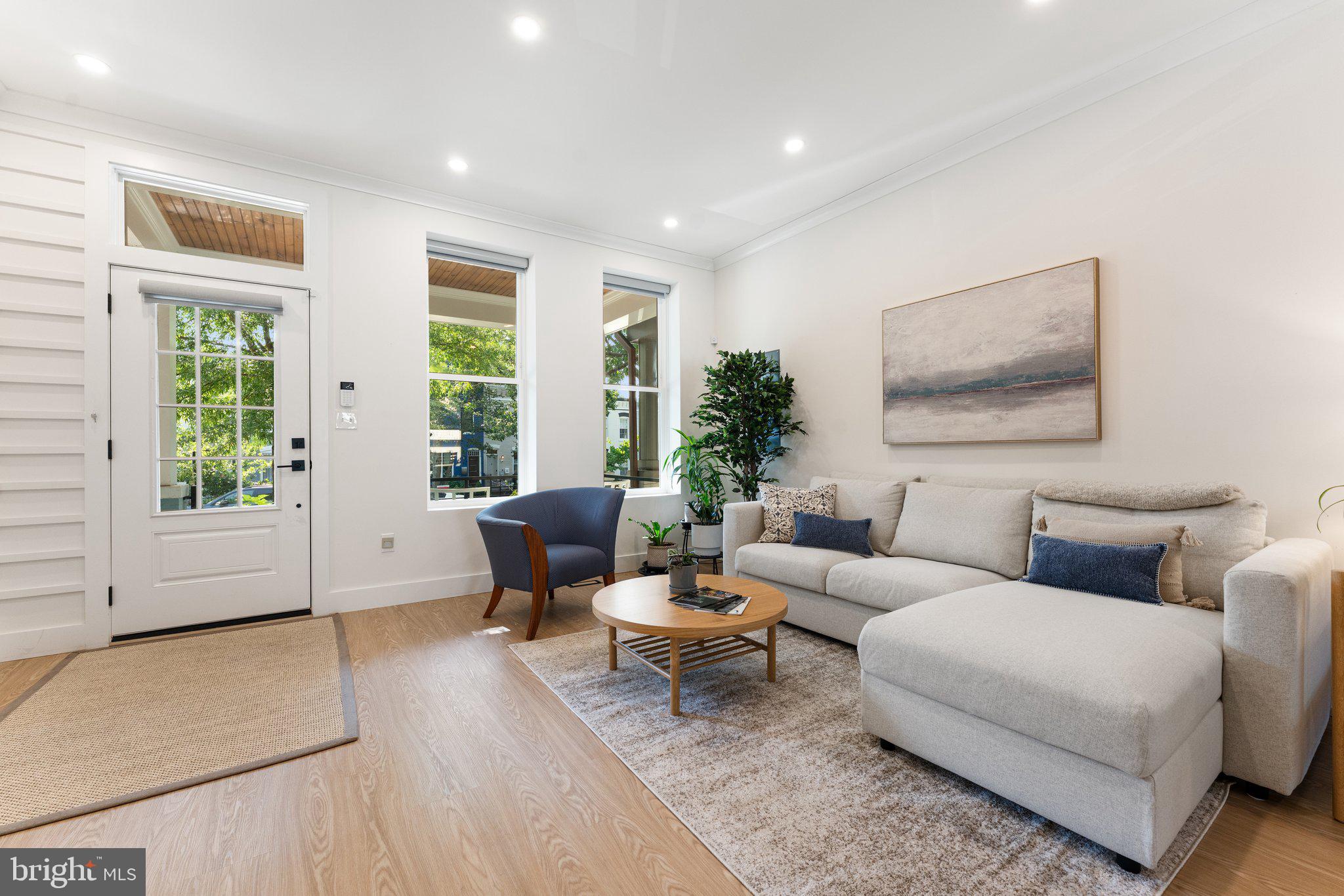 922 8th Street Northeast Washington, DC 20002 - Photo 2 of 44 a living room with furniture and large windows