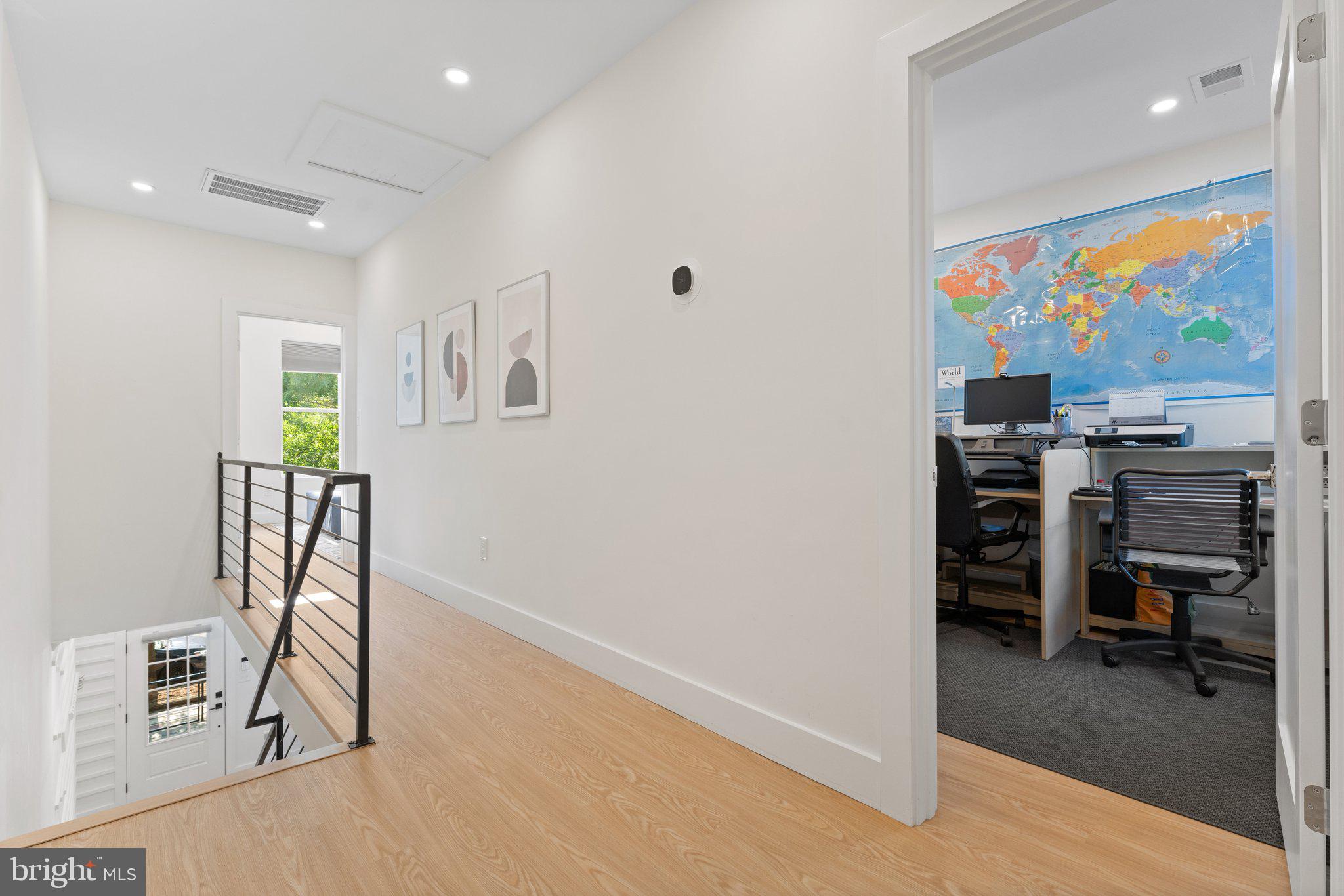 922 8th Street Northeast Washington, DC 20002 - Photo 25 of 44 a view of a workspace with furniture and a window
