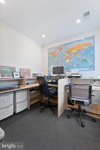 a room with furniture and air hockey table