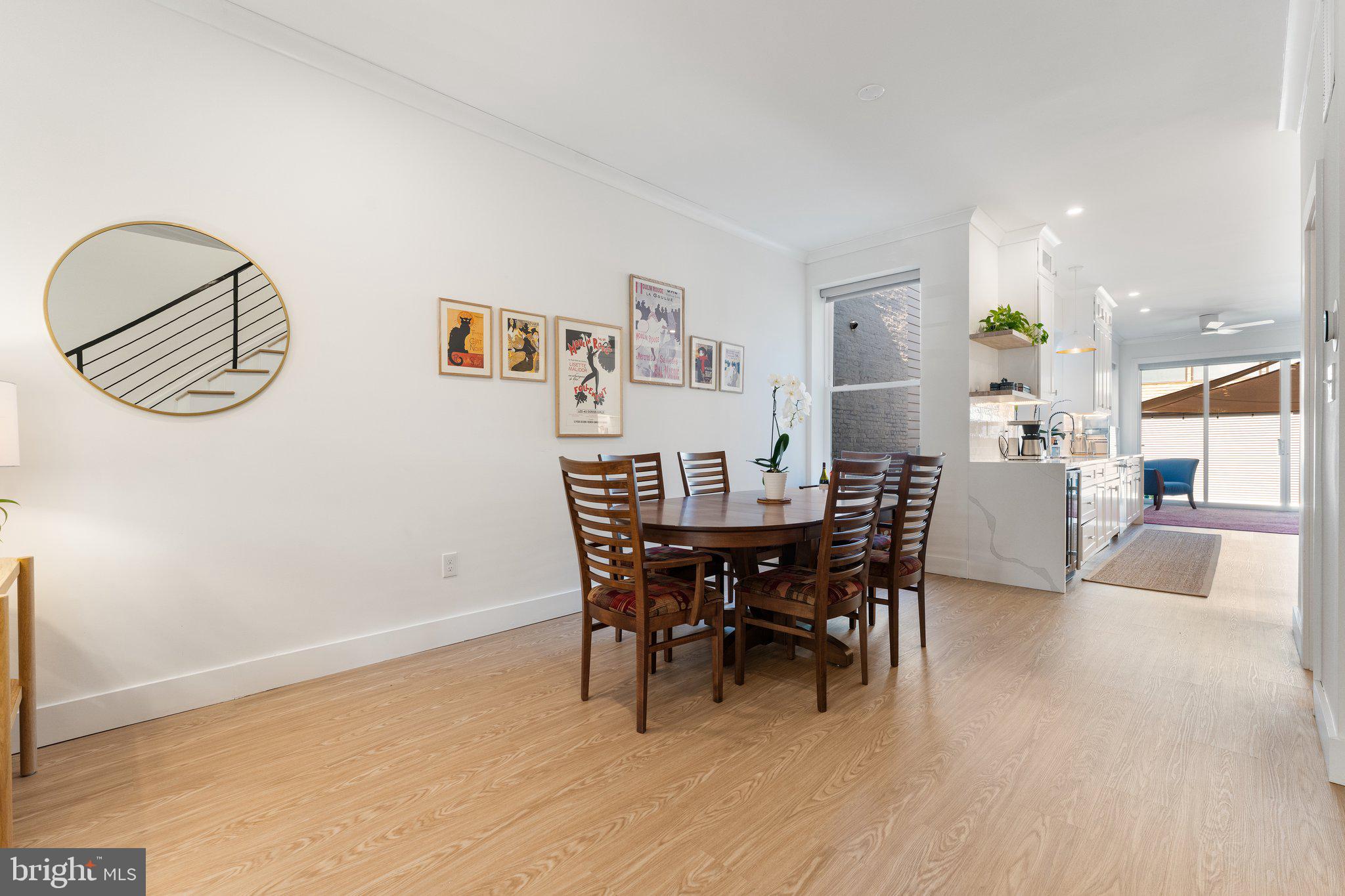 922 8th Street Northeast Washington, DC 20002 - Photo 6 of 44 a view of a dining room with furniture and wooden floor
