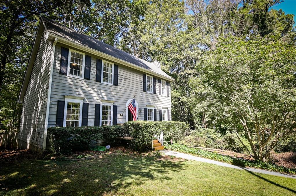40 Mildred Lane Covington, GA 30016 - Photo 2 of 56 a front view of a house with a yard