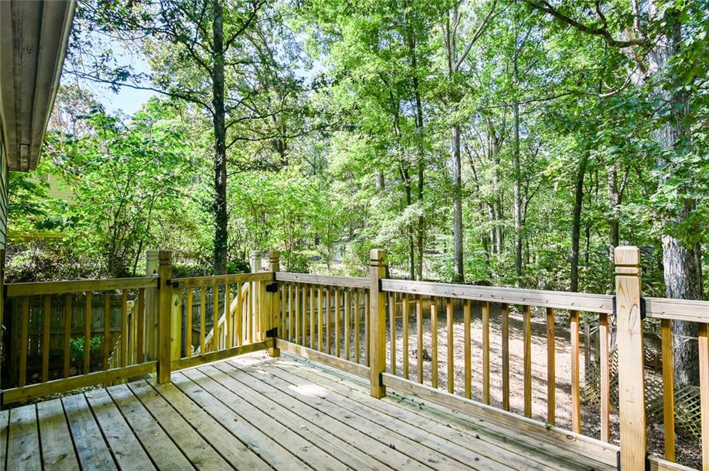 40 Mildred Lane Covington, GA 30016 - Photo 23 of 56 a view of a balcony with wooden floor