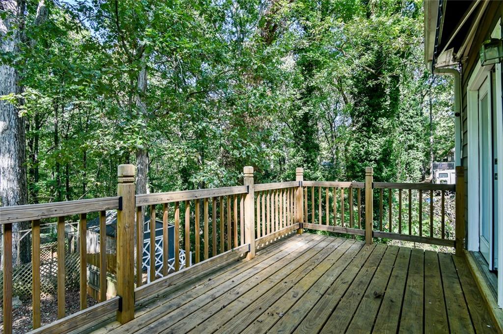40 Mildred Lane Covington, GA 30016 - Photo 24 of 56 a view of balcony with wooden floor and fence