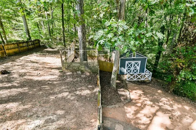 a view of a walk in closet and bedroom
