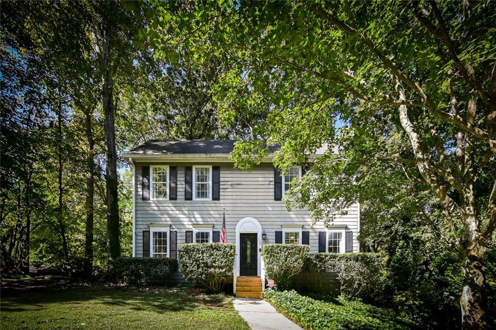 40 Mildred Lane Covington, GA 30016 - Photo 3 of 56 a front view of a house with a yard