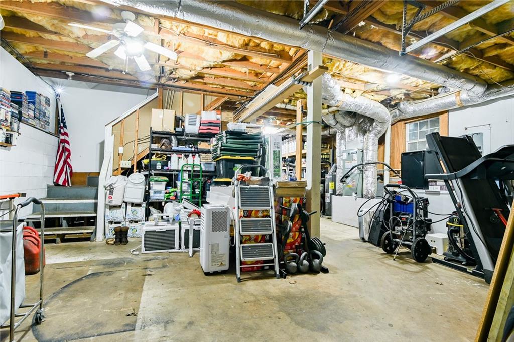40 Mildred Lane Covington, GA 30016 - Photo 31 of 56 a view of a storage room with windows