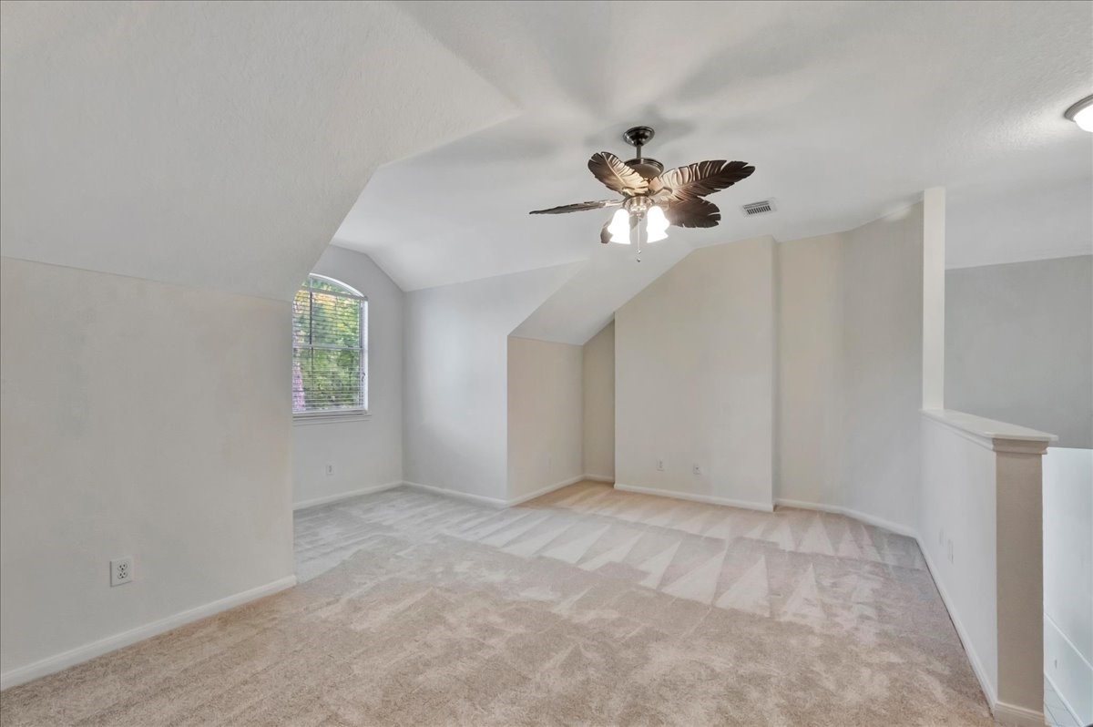 14010 Hazel Ridge Court Houston, TX 77062 - Photo 24 of 38 The stairs are located to the right of this frame. Note this space could be renovated and converted into a 4th bedroom.