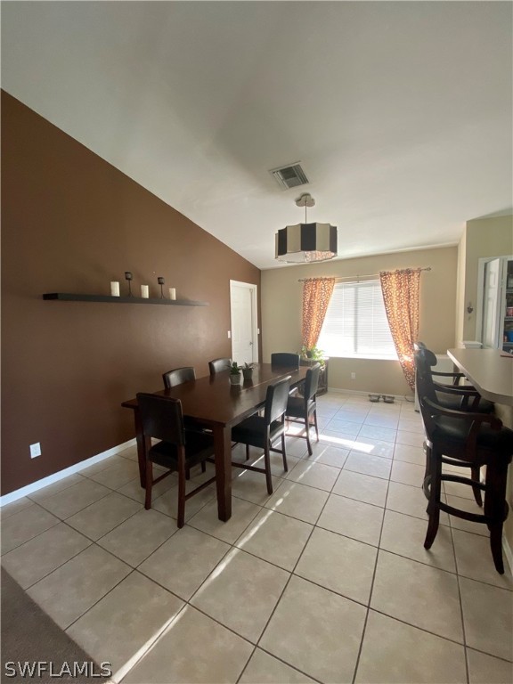 8293 Bahamas Road Fort Myers, FL 33967 - Photo 18 of 22 a living room with furniture a large window and a potted plant