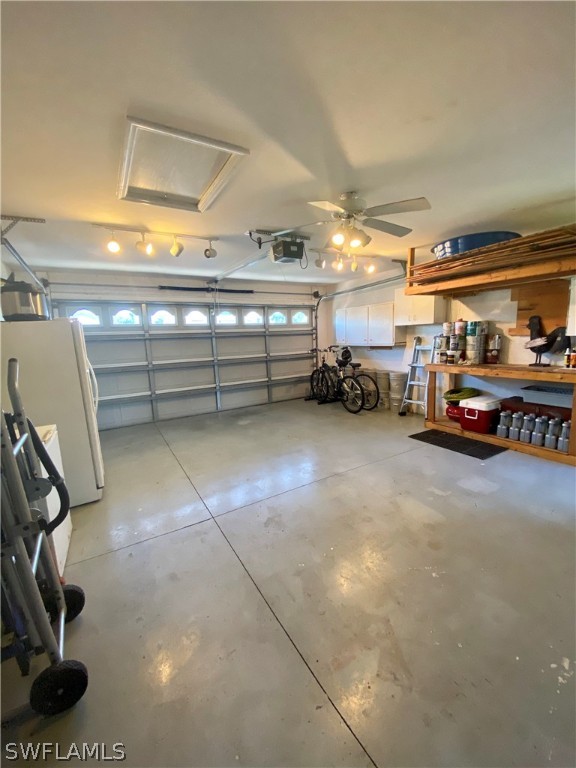 8293 Bahamas Road Fort Myers, FL 33967 - Photo 20 of 22 a view of parking garage with cars and a window