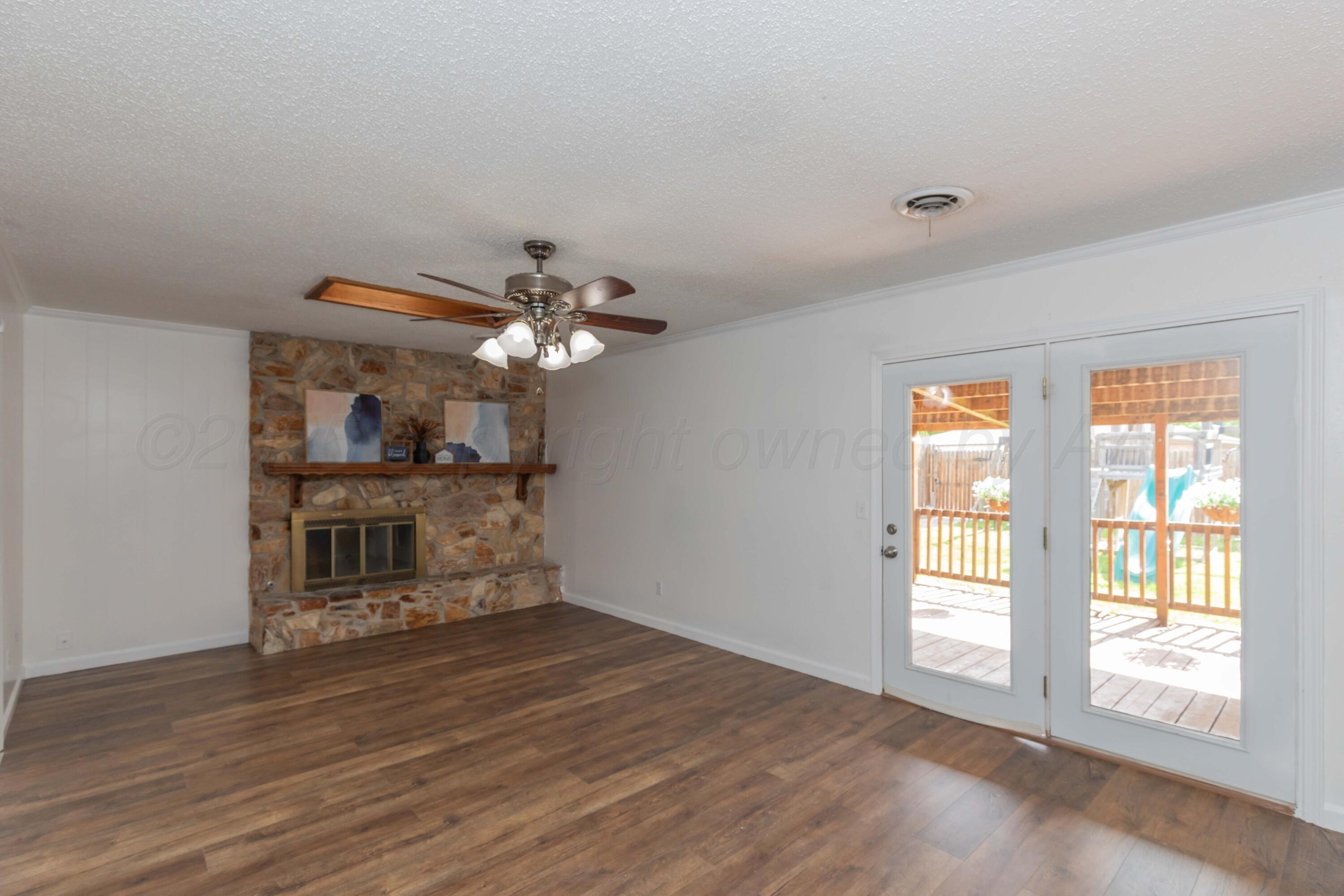 5123 Benton Drive Amarillo, TX 79110 - Photo 4 of 34 LIVING ROOM VIEW 1