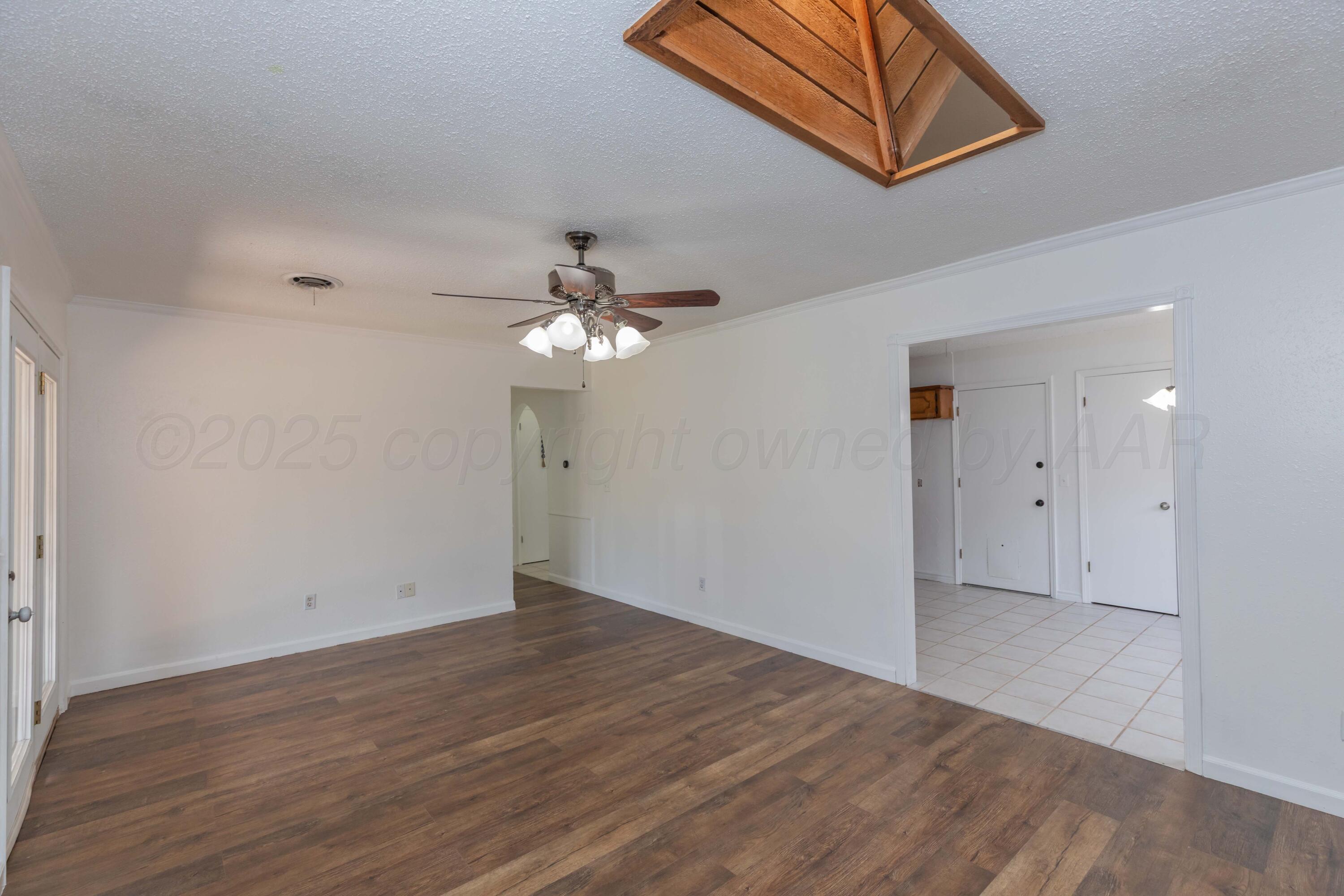 5123 Benton Drive Amarillo, TX 79110 - Photo 6 of 34 LIVING ROOM VIEW 3