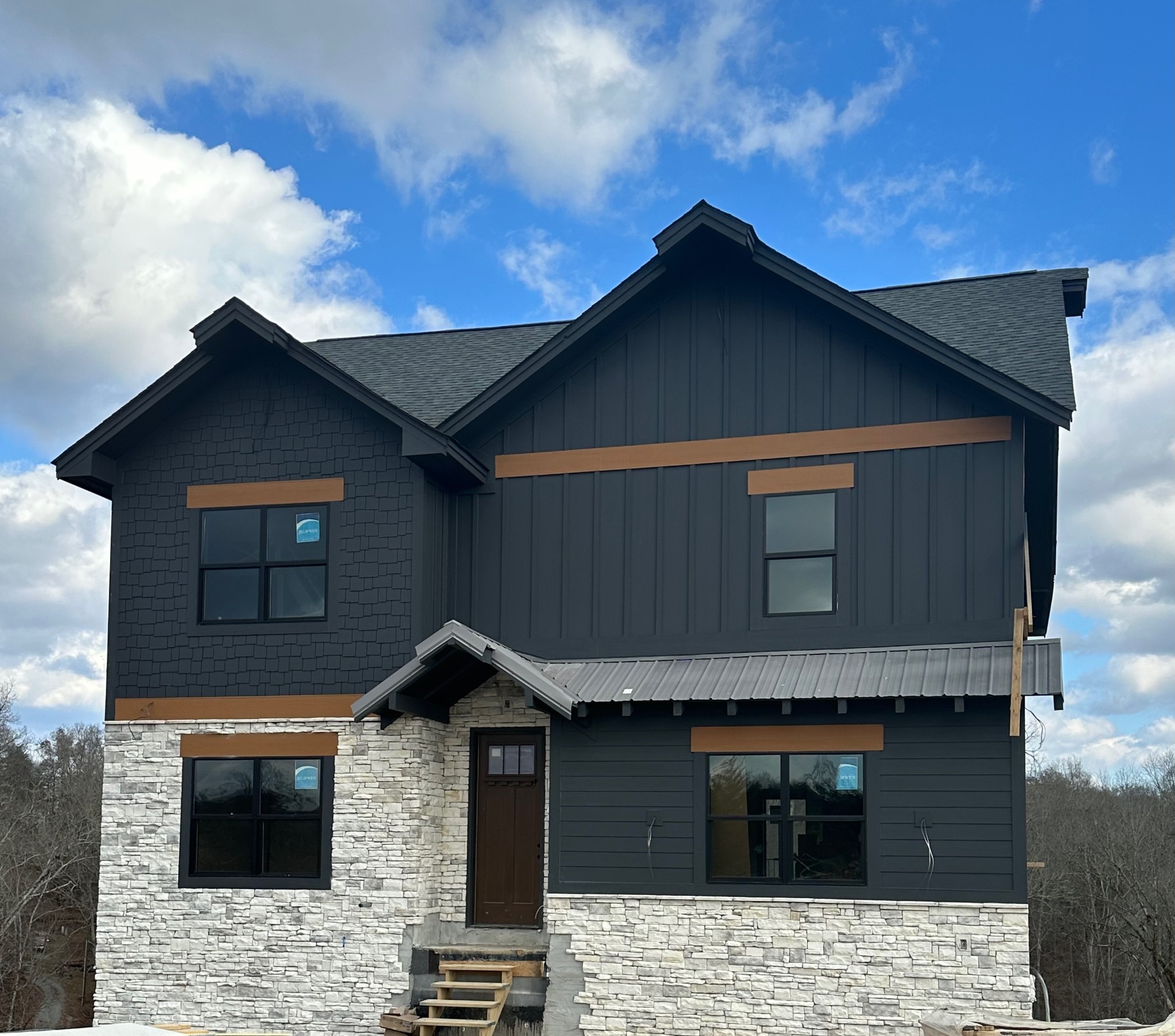 328 Rambling Creek Way Sevierville, TN 37862 - Photo 1 of 66 a front view of a house with garage