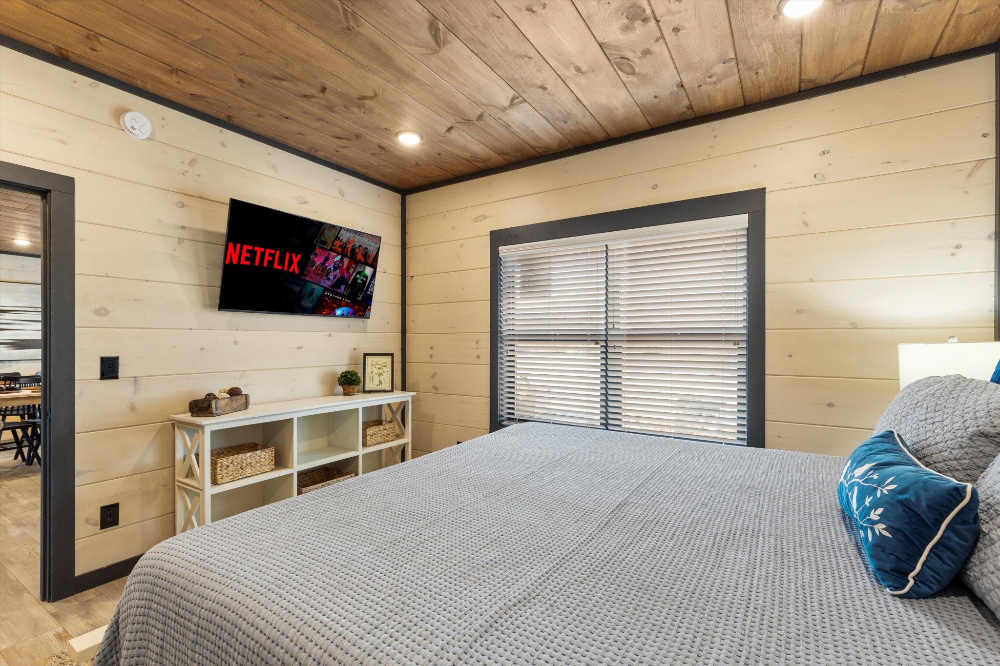 328 Rambling Creek Way Sevierville, TN 37862 - Photo 38 of 66 a bedroom with a bed and a flat screen tv