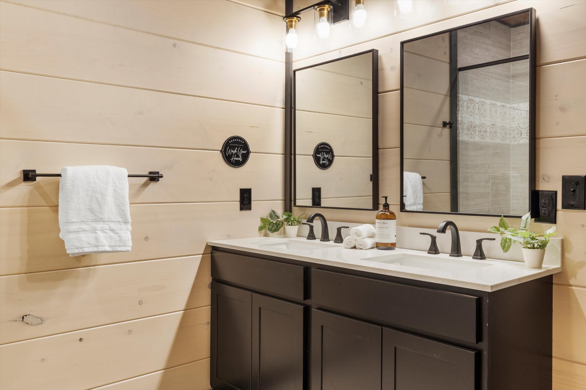 328 Rambling Creek Way Sevierville, TN 37862 - Photo 45 of 66 a bathroom with a double vanity sink a mirror and shower