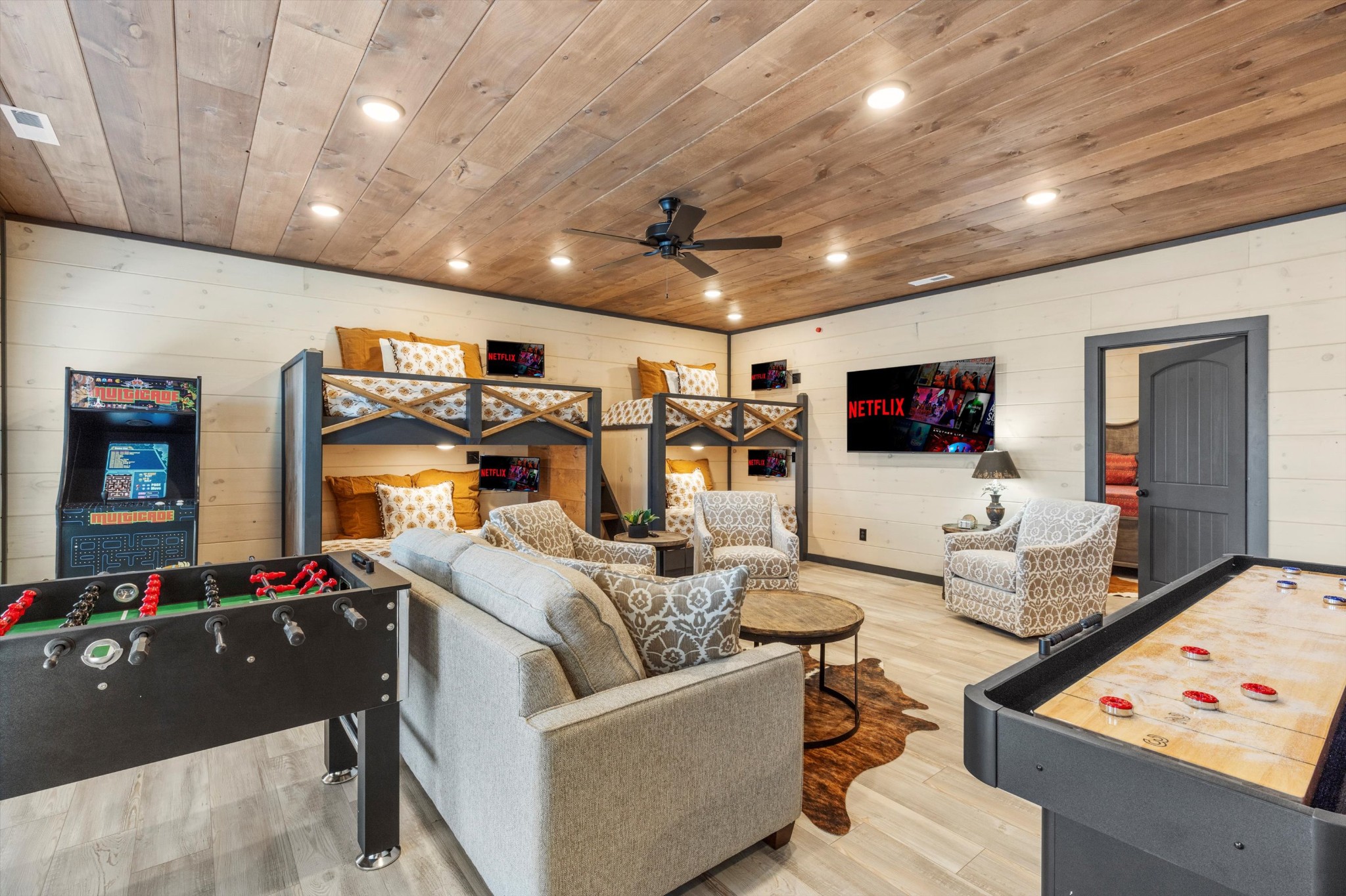 328 Rambling Creek Way Sevierville, TN 37862 - Photo 48 of 66 a living room with furniture and a flat screen tv