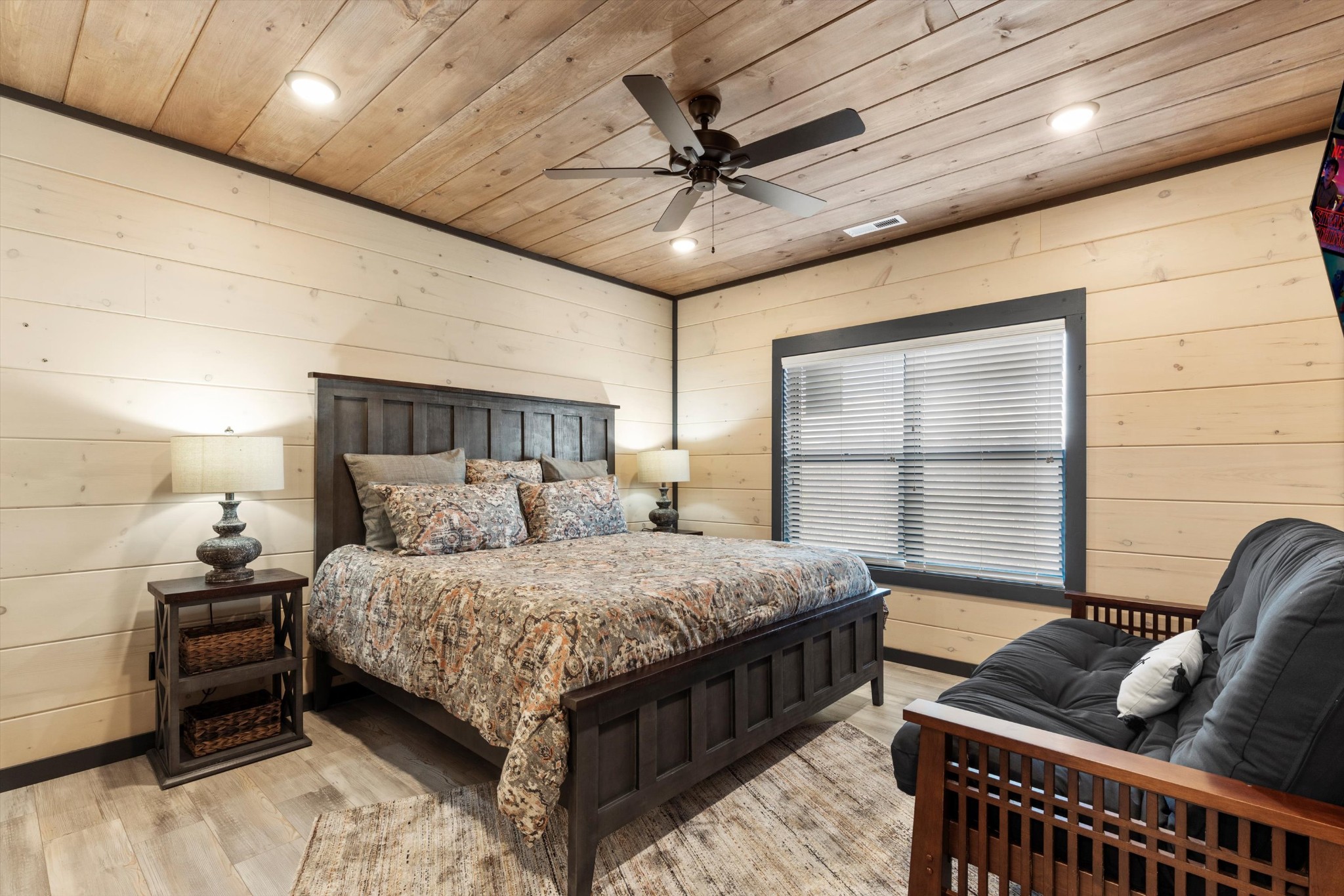 328 Rambling Creek Way Sevierville, TN 37862 - Photo 54 of 66 a bedroom with a bed couch and a window