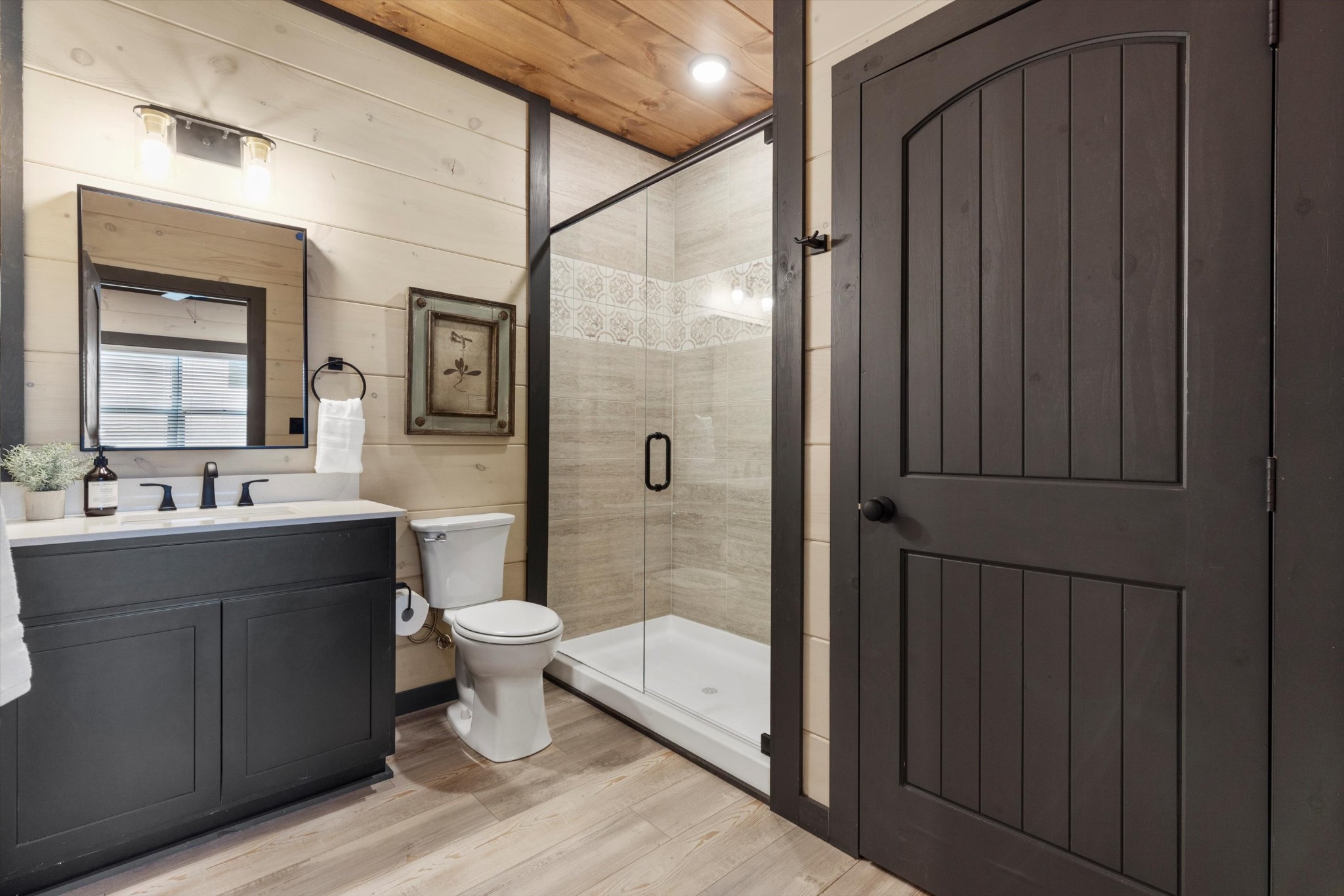 328 Rambling Creek Way Sevierville, TN 37862 - Photo 56 of 66 a bathroom with a sink a toilet and shower