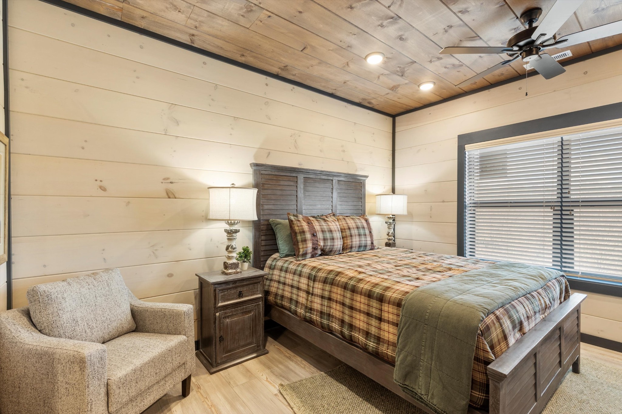 328 Rambling Creek Way Sevierville, TN 37862 - Photo 60 of 66 a bedroom with a bed and a couch