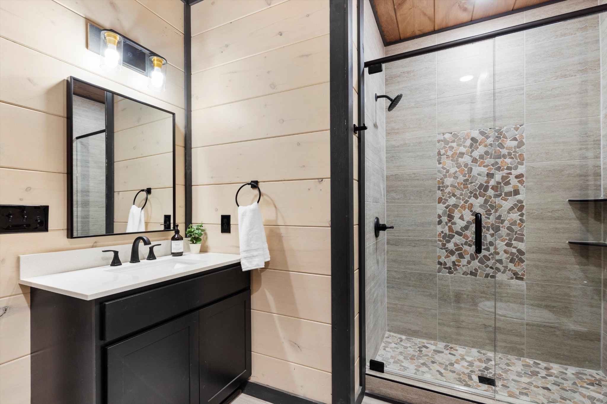 328 Rambling Creek Way Sevierville, TN 37862 - Photo 62 of 66 a bathroom with a sink and a mirror